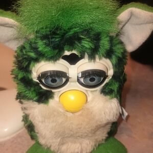 Green and Black Doll with Accessories